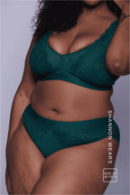 A woman wearing a green lace lingerie set ^Shannon | Size: 36 FF-G  / 16