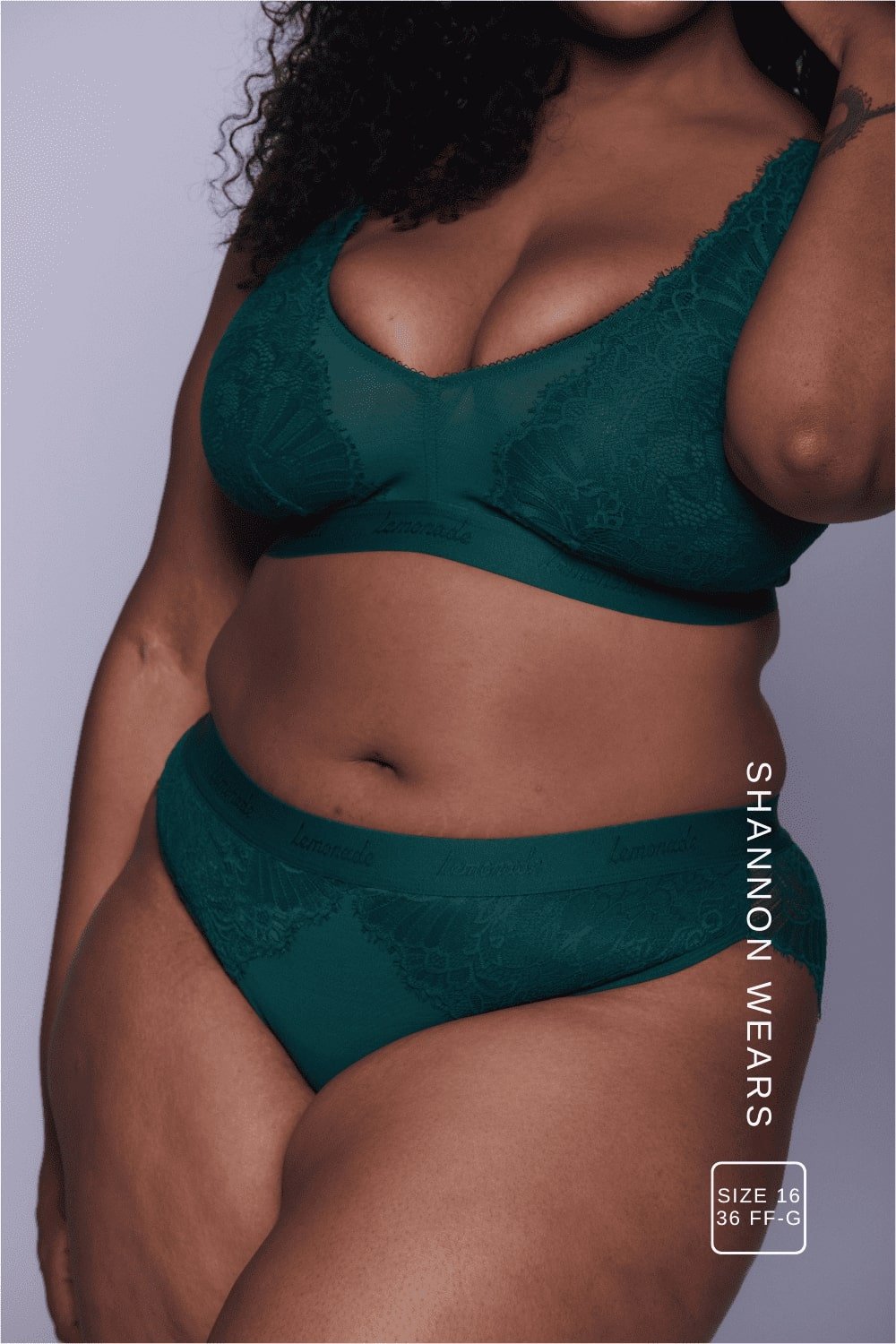 A woman wearing a green lace lingerie set ^Shannon | Size: 36 FF-G  / 16
