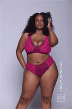 A woman wearing a matching lingerie set in pink ^Shannon | Size: 36 FF-G / 16