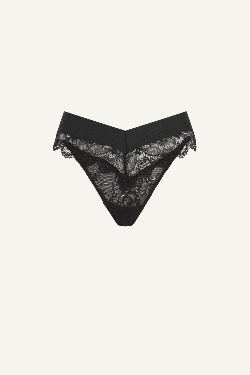 A ghost image of the front of a black lace brazilian 