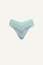 A ghost image of the front of a blue lace brazilian knicker 